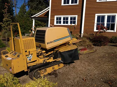 Stump grinding equipment at a residential job