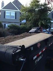 Debris loaded for haul-away
